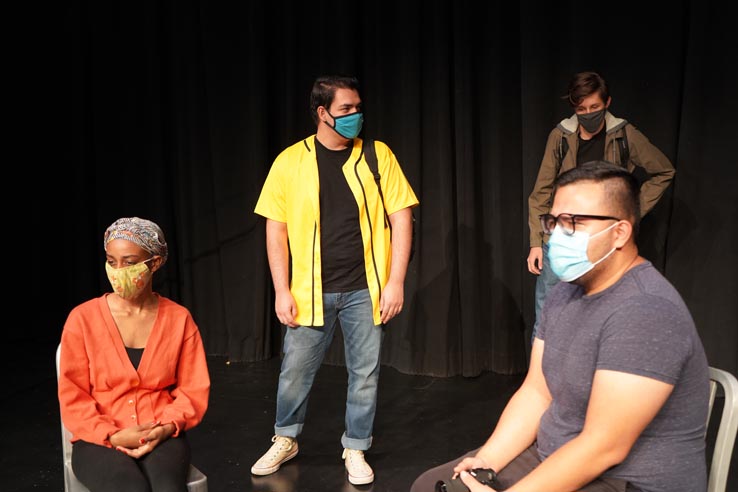 Theatre students wearing protective masks