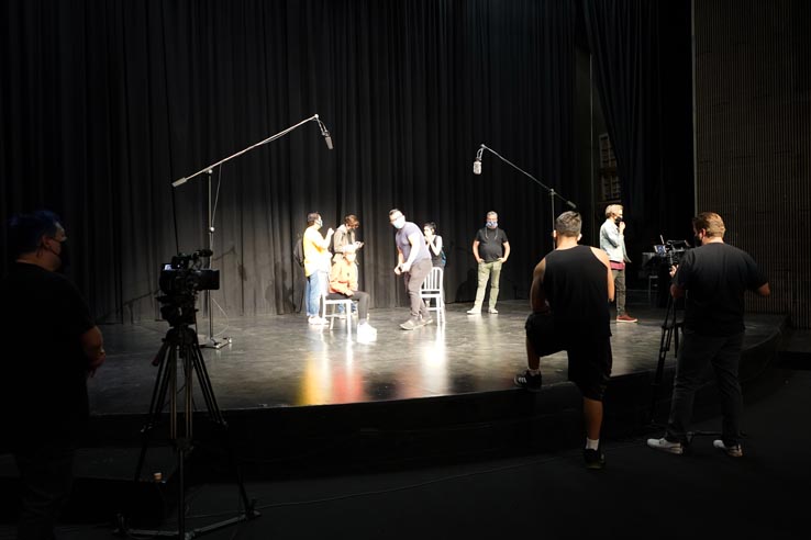 Theatre students wearing protective masks