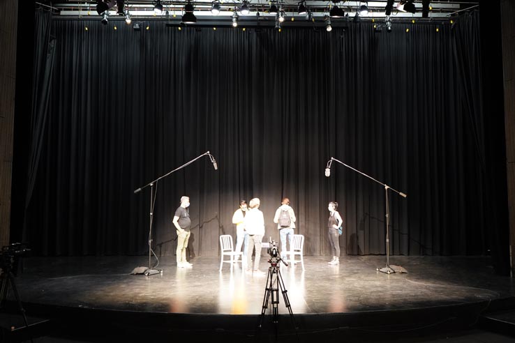 Theatre students wearing protective masks