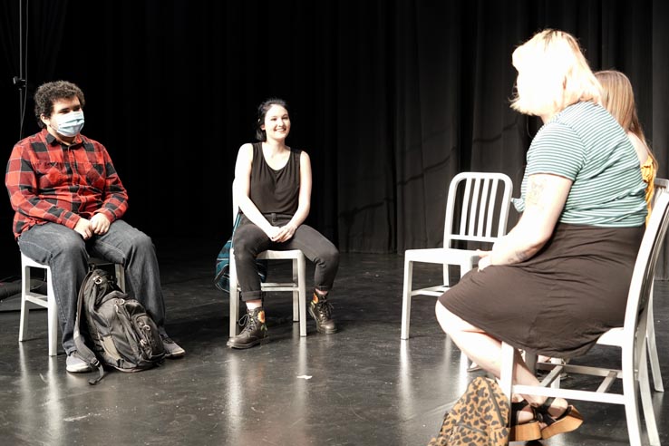 Theatre students wearing protective masks