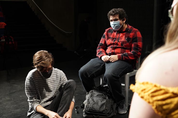 Theatre students wearing protective masks