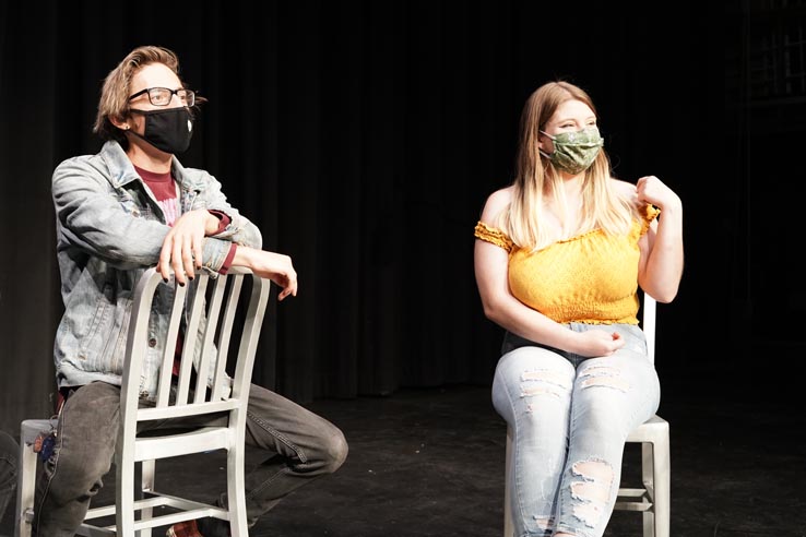 Theatre students wearing protective masks