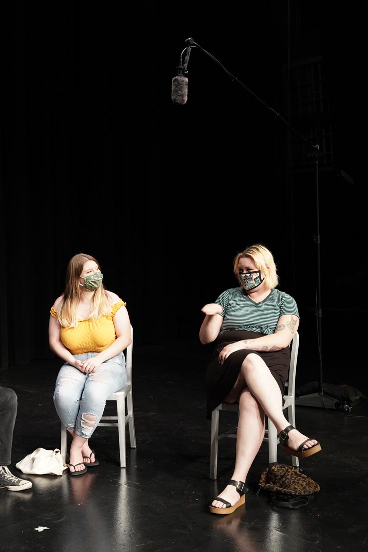 Theatre students wearing protective masks