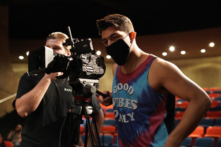 Theatre students wearing protective masks