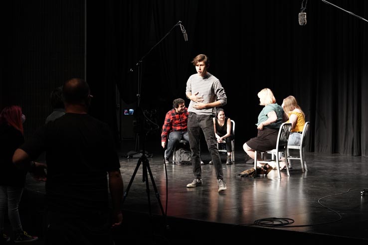 Theatre students wearing protective masks