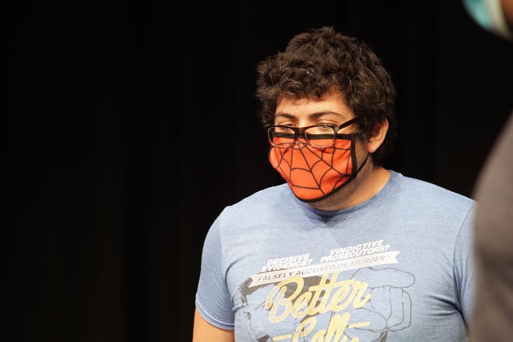 Theatre students wearing protective masks