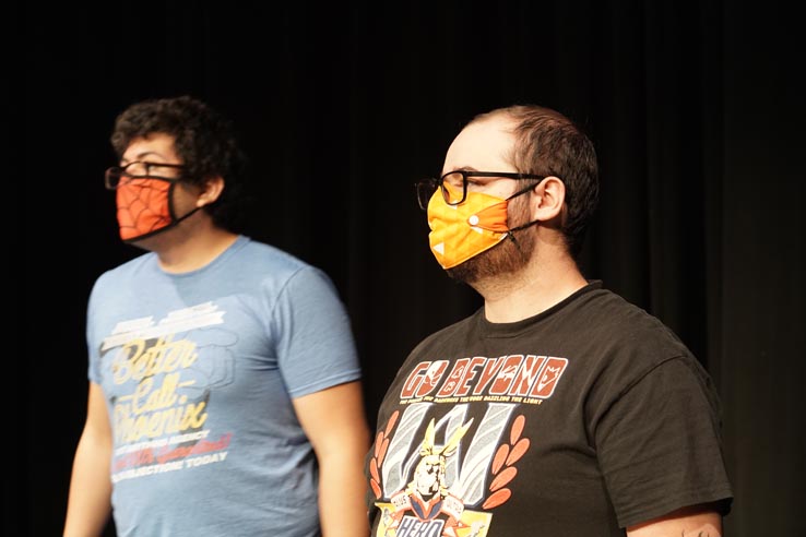 Theatre students wearing protective masks