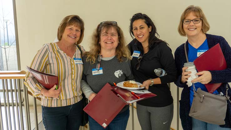 People enjoying the ASL Educator's Conference