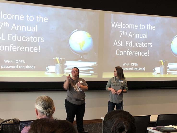 People enjoying the ASL Educator's Conference