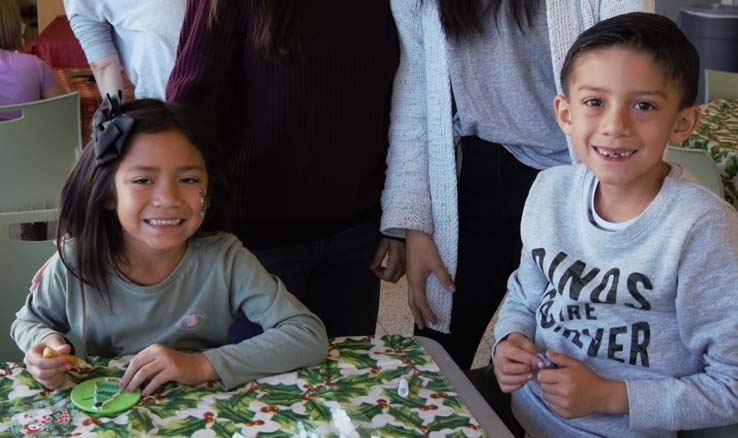 People enjoying the EOPS Holiday Celebration