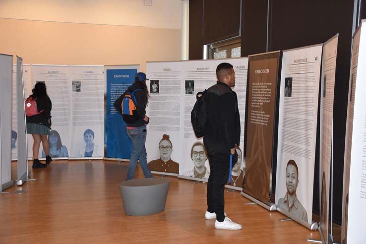 A student browsing the gallery at the event.