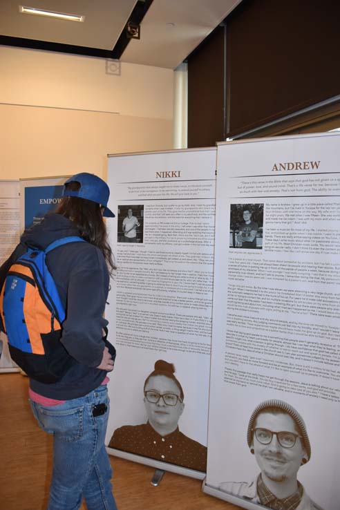 A student browsing the gallery at the event.