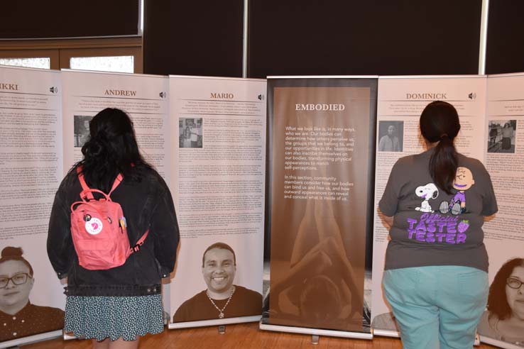 A student browsing the gallery at the event.