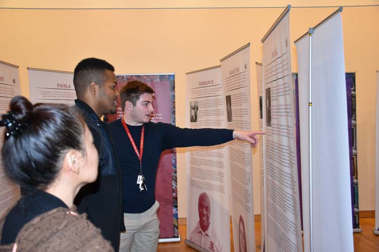 A student browsing the gallery at the event.