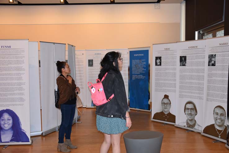 A student browsing the gallery at the event.