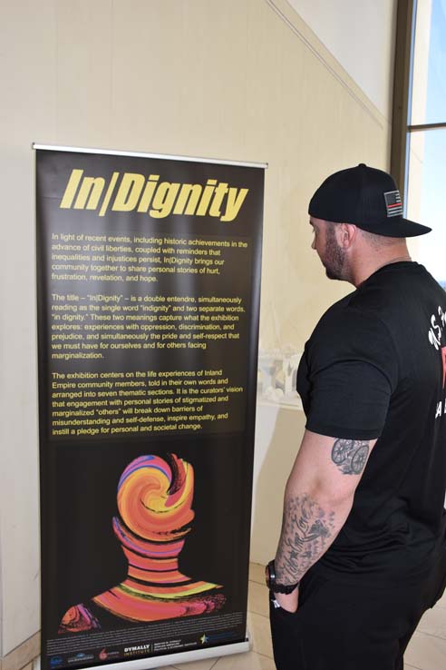 A student browsing the gallery at the event.