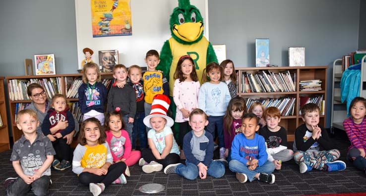 Children and Crafton Roadrunner Mascot enjoying Read Across America event