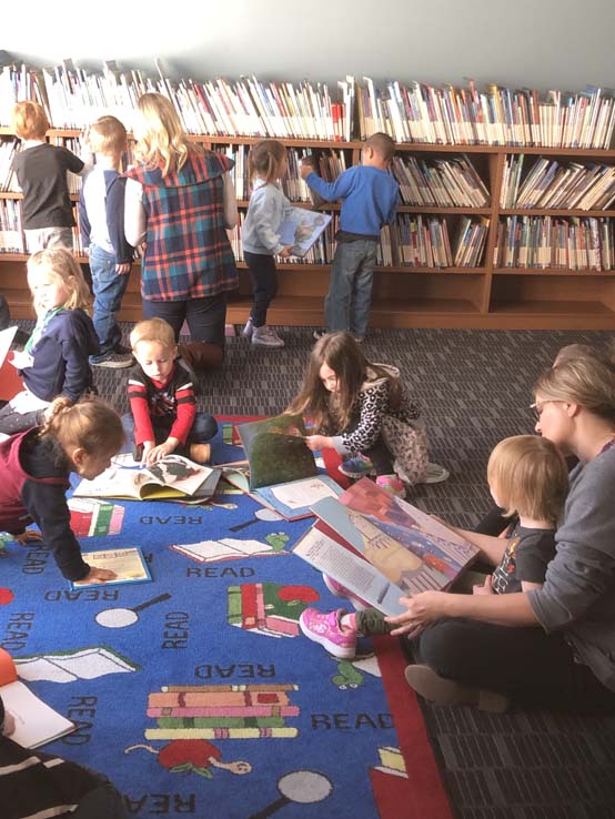 Children and Crafton Roadrunner Mascot enjoying Read Across America event