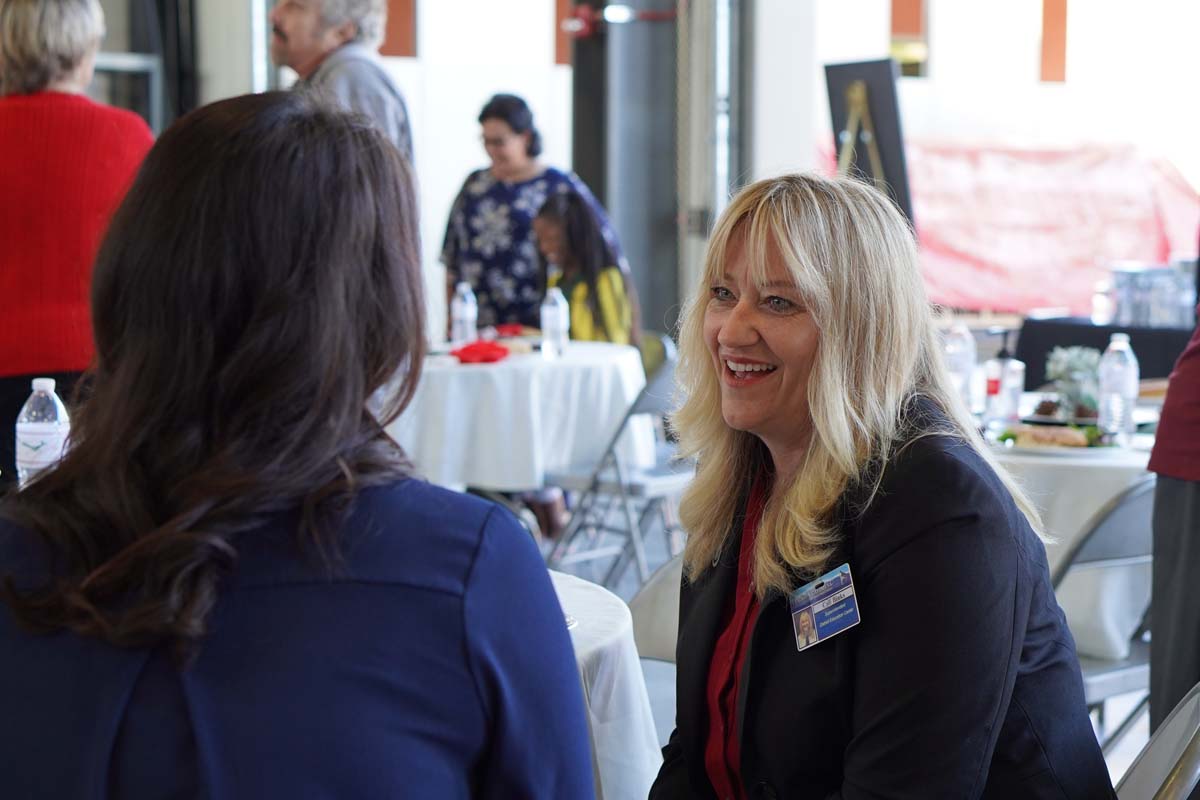 People enjoying yhe Friends Annual Luncheon