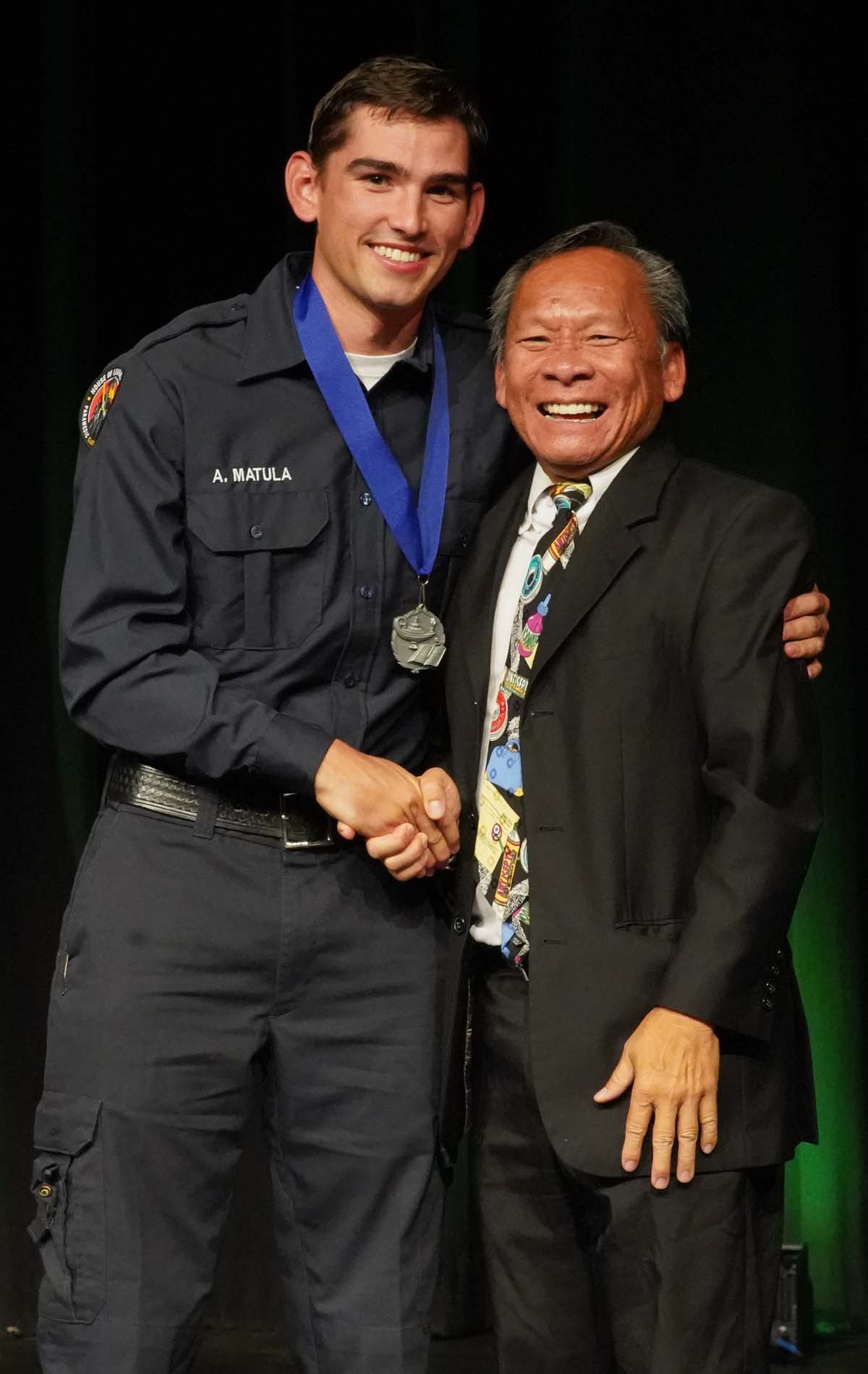 People enjoying the PAramedic Graduation