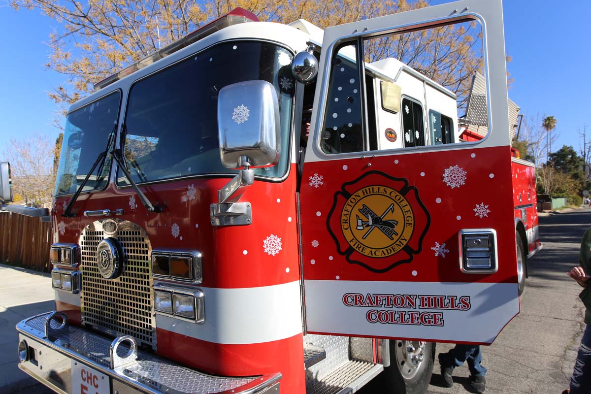 People enjoying the Yucaipa Christmas Parade