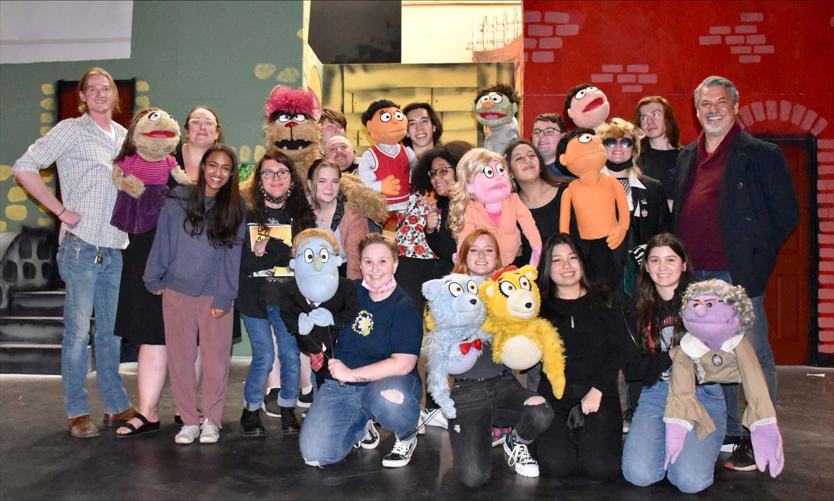 Performers at an Avenue Q rehearsal