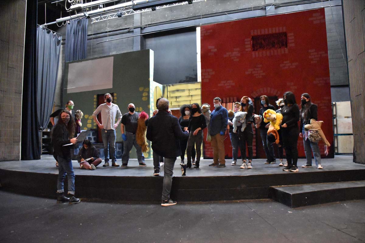 Performers at an Avenue Q rehearsal