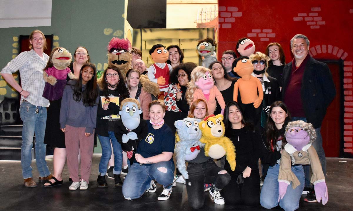 Performers at an Avenue Q rehearsal