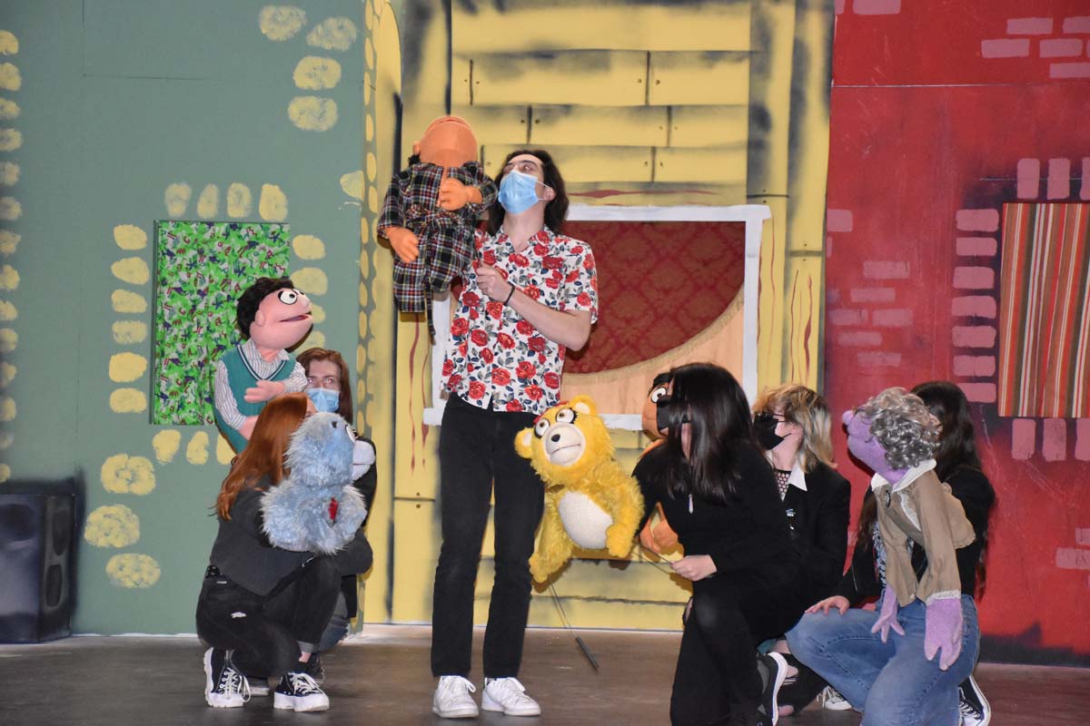 Performers at an Avenue Q rehearsal