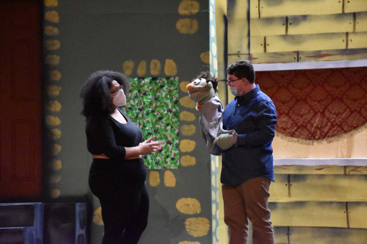 Performers at an Avenue Q rehearsal