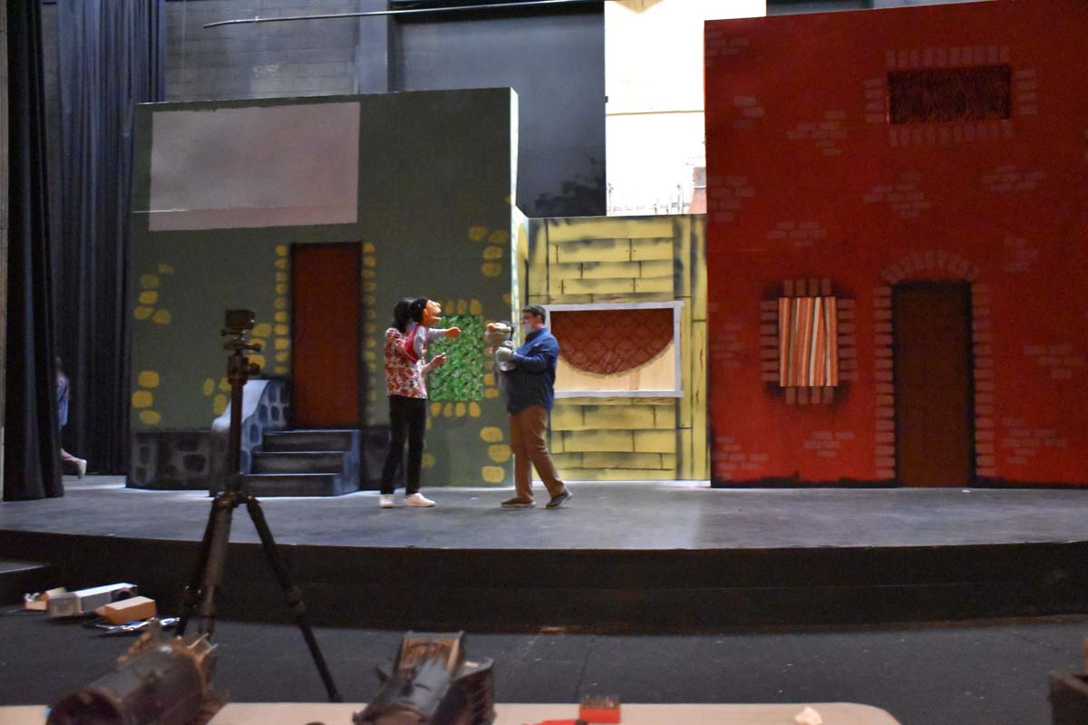 Performers at an Avenue Q rehearsal