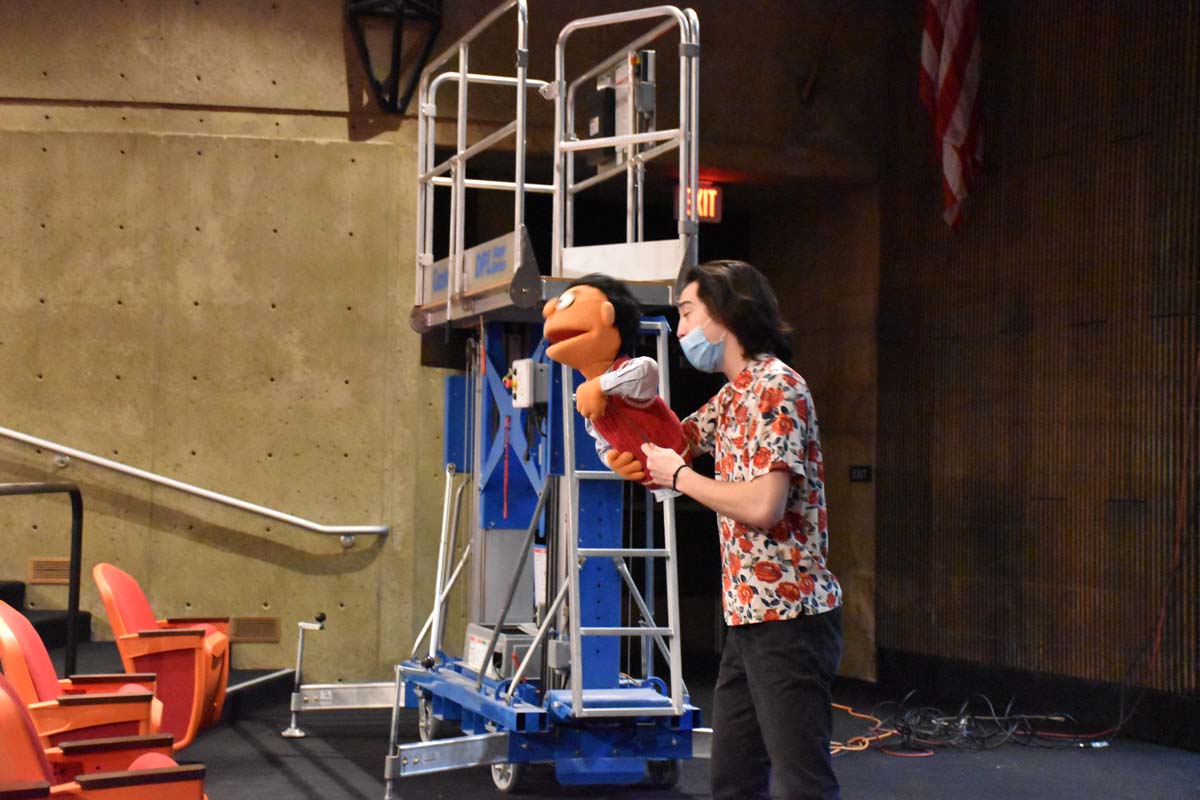 Performers at an Avenue Q rehearsal