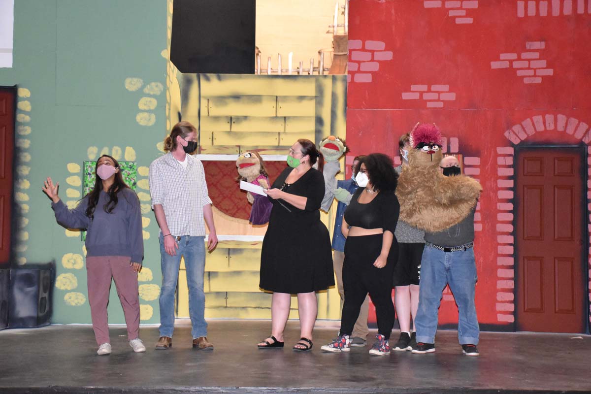 Performers at an Avenue Q rehearsal