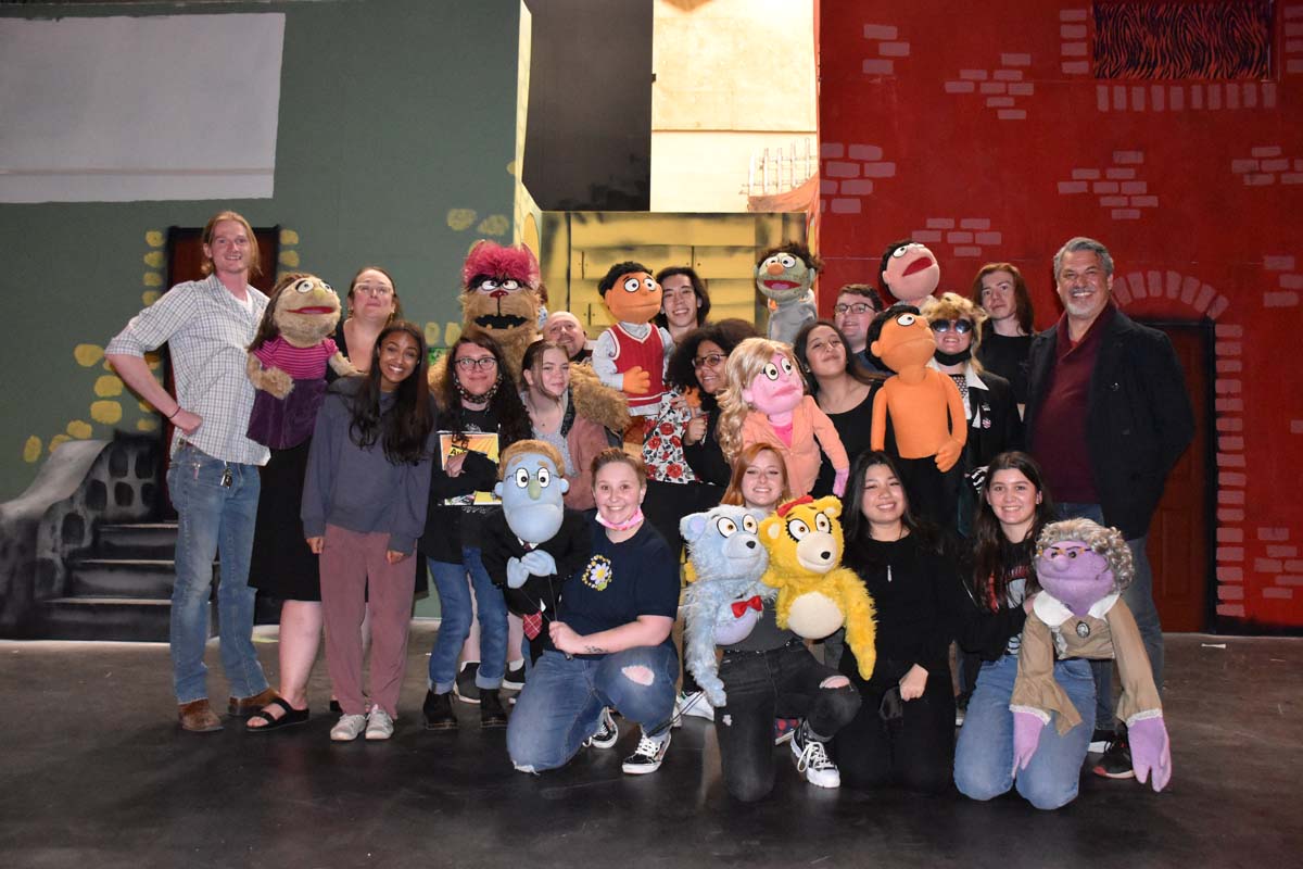 Performers at an Avenue Q rehearsal