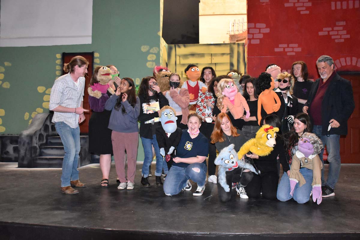 Performers at an Avenue Q rehearsal