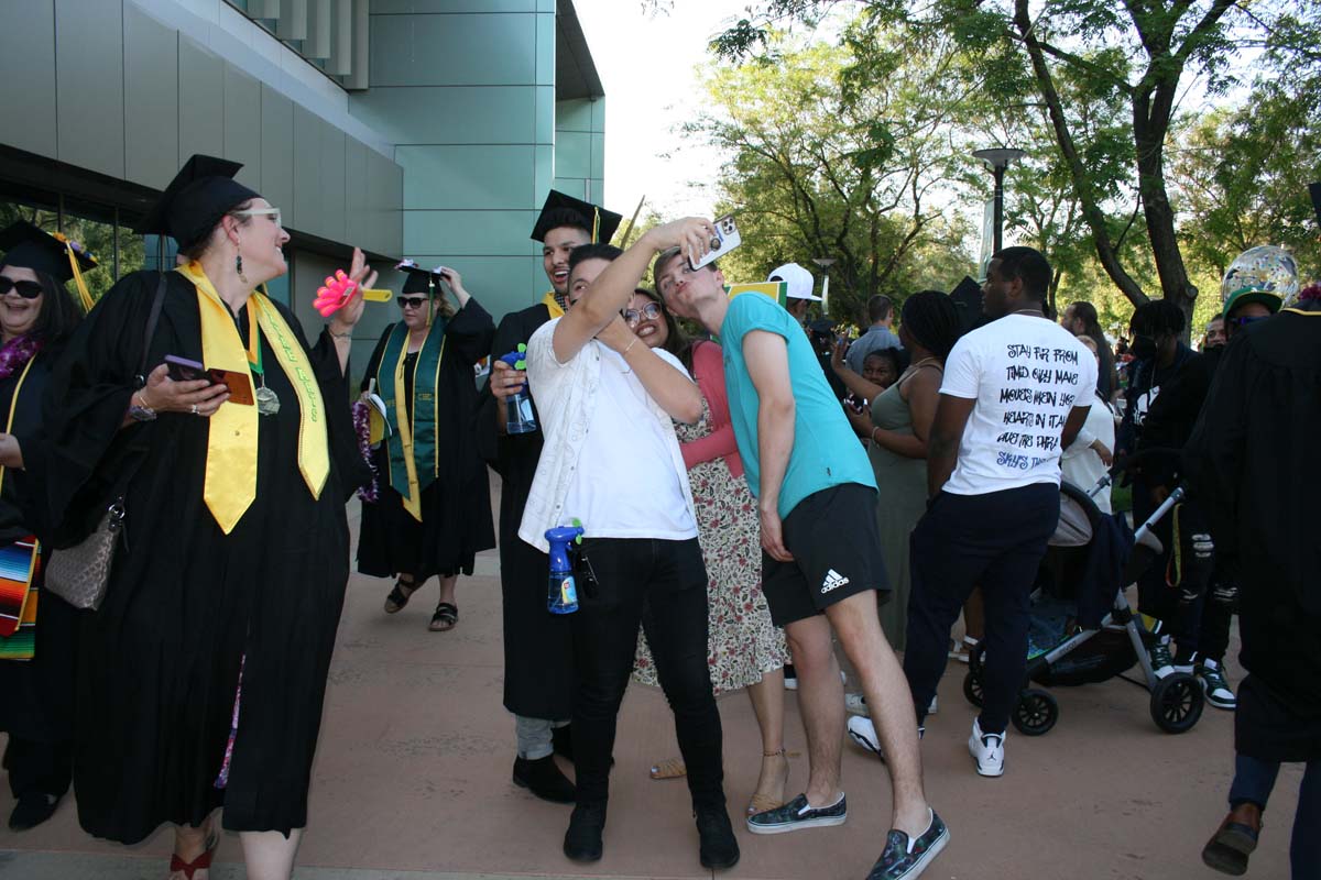 People enjoying Commencement