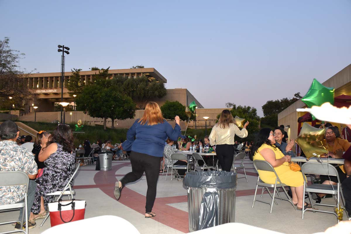 People enjoying the EOP&S Awards Ceremony