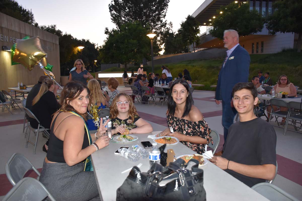 People enjoying the EOP&S Awards Ceremony