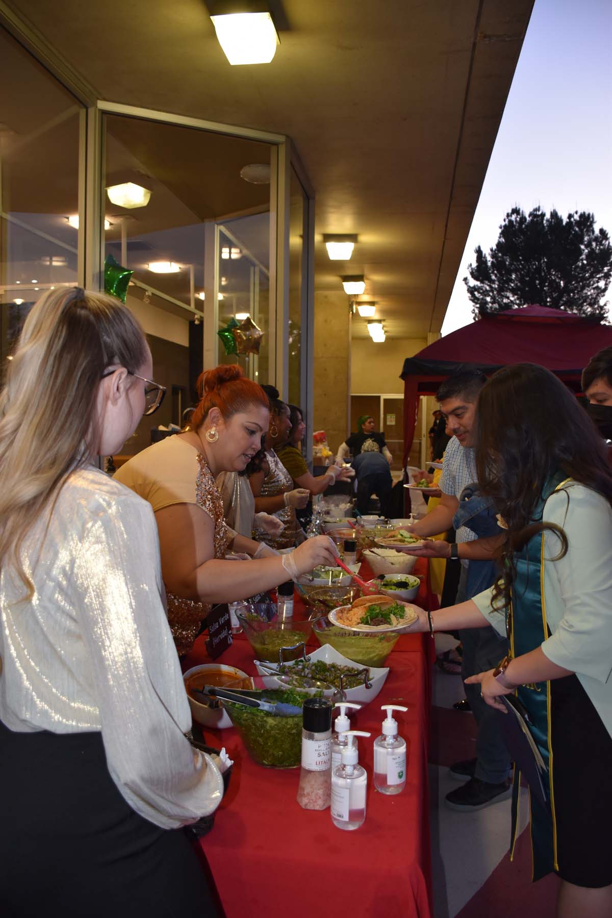 People enjoying the EOP&S Awards Ceremony