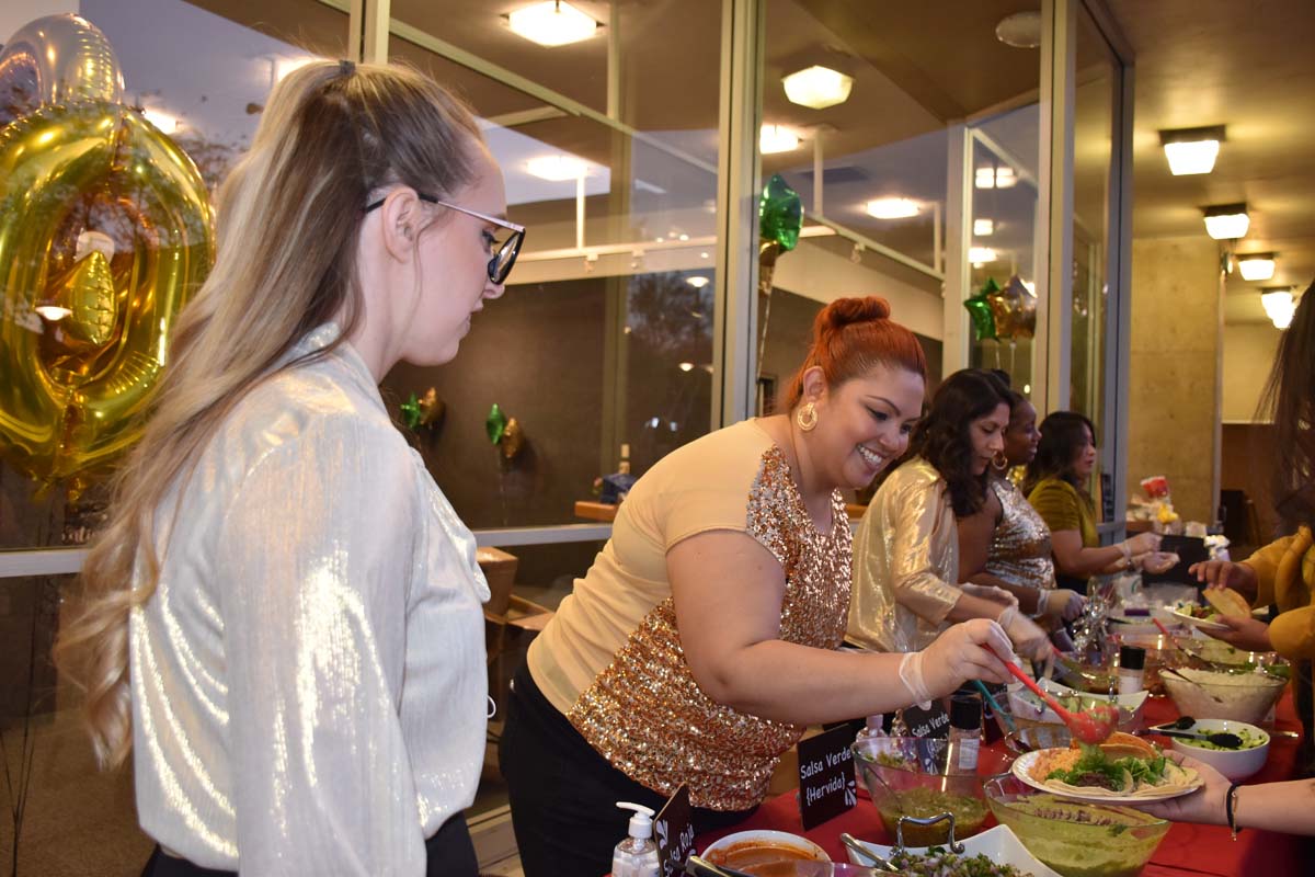 People enjoying the EOP&S Awards Ceremony