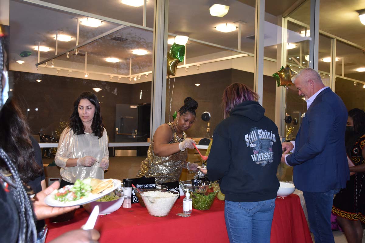 People enjoying the EOP&S Awards Ceremony