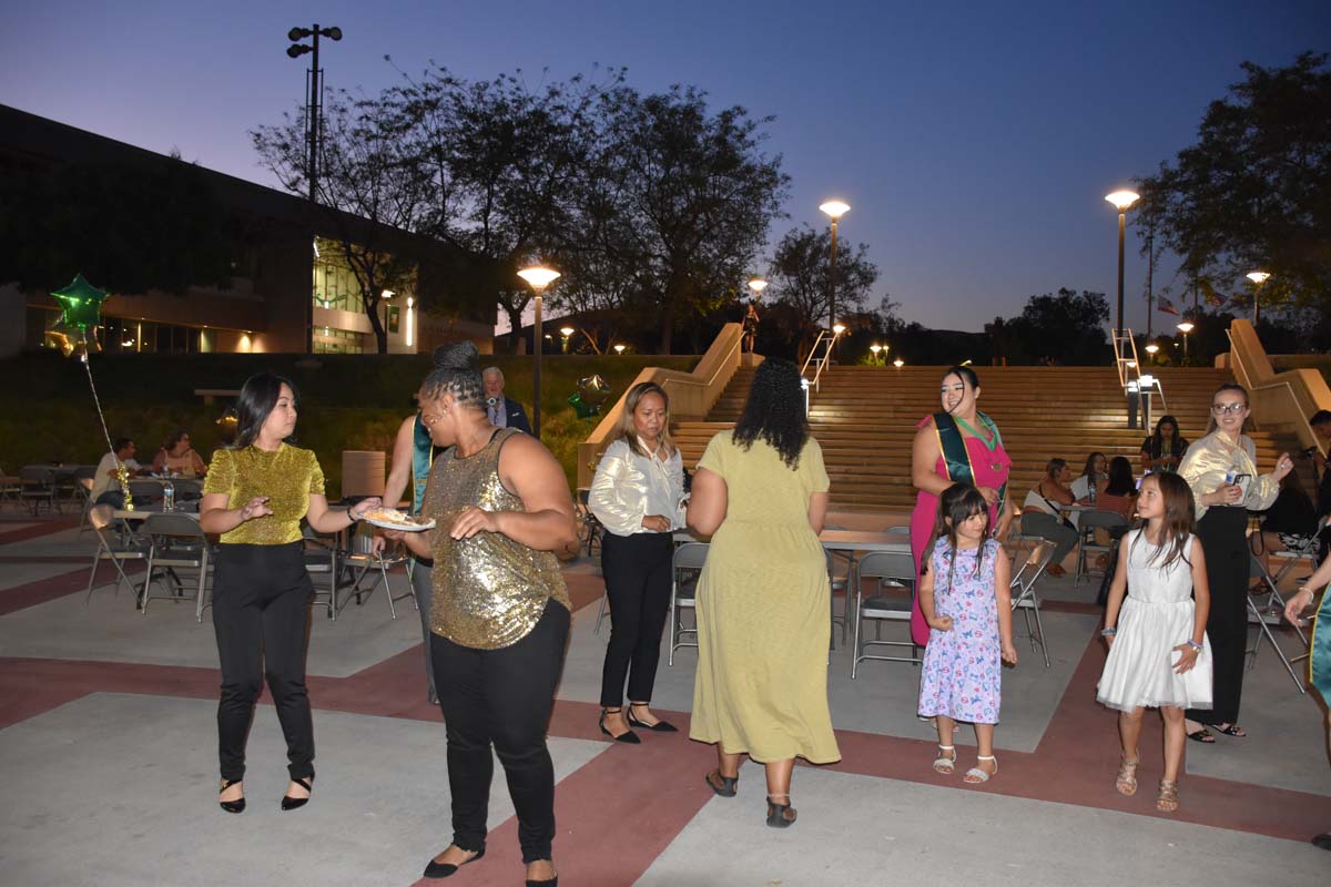 People enjoying the EOP&S Awards Ceremony