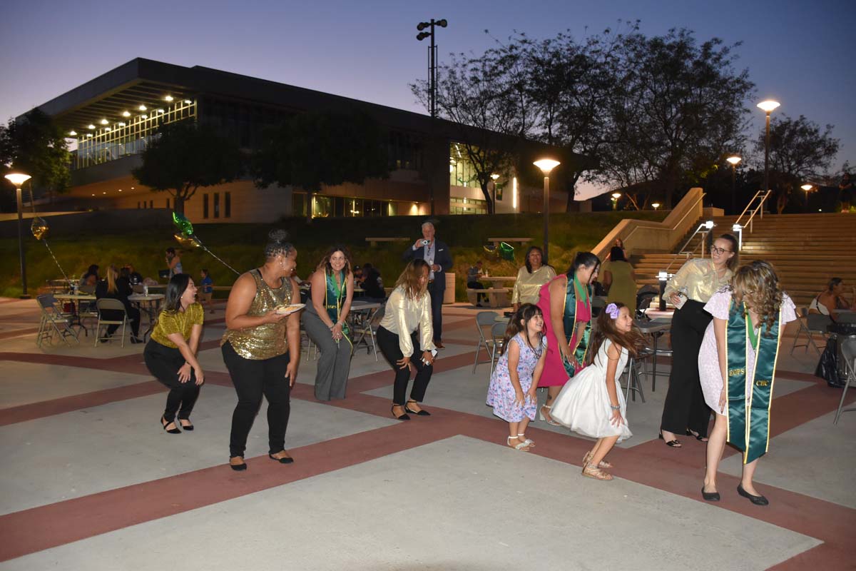 People enjoying the EOP&S Awards Ceremony