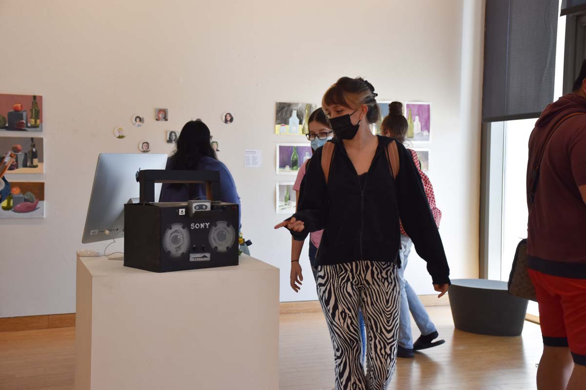 People enjoying the Student Art Exhibit