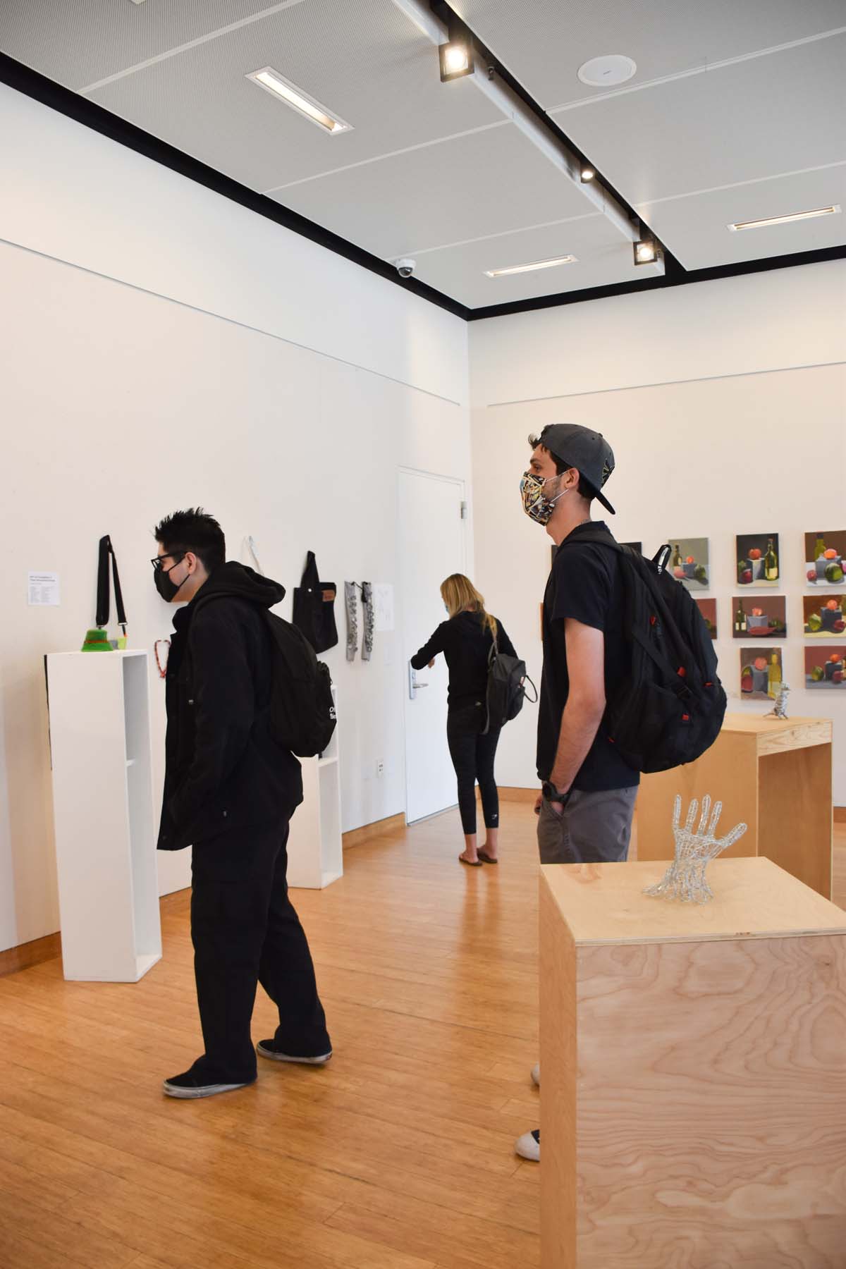 People enjoying the Student Art Exhibit