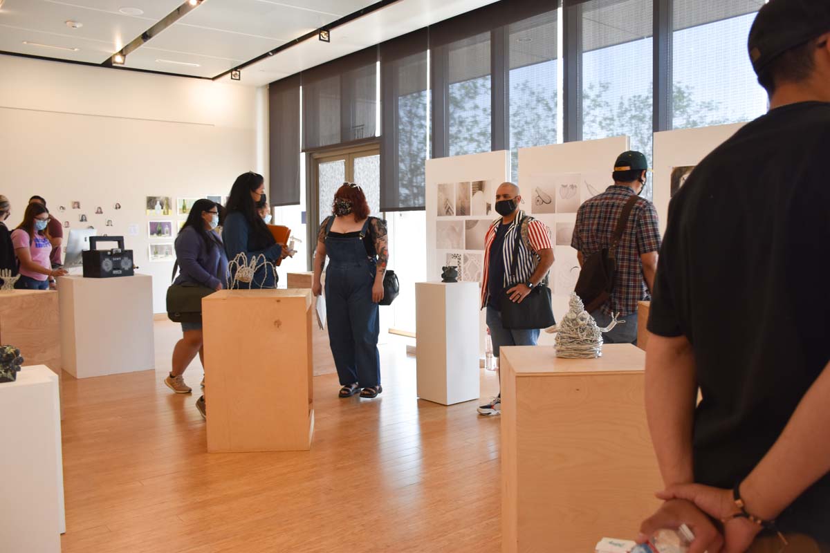 People enjoying the Student Art Exhibit