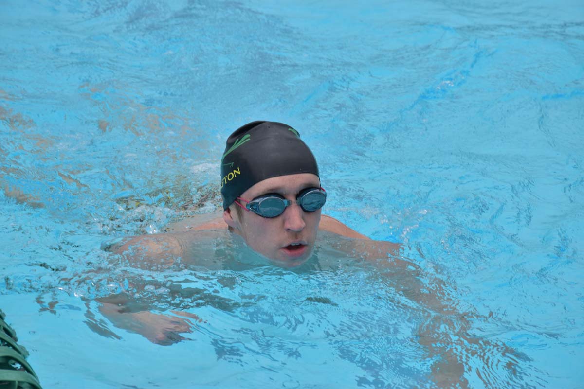 People enjoying the swim meet