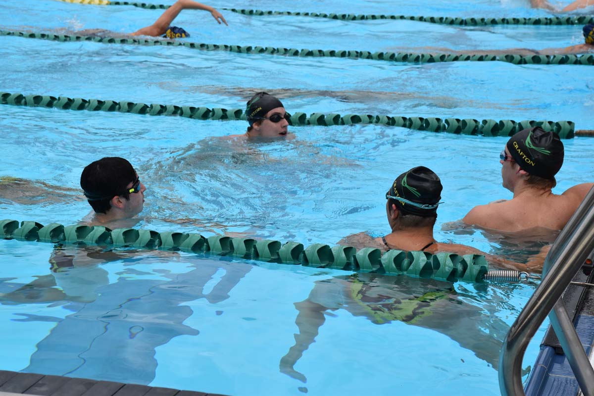 People enjoying the swim meet