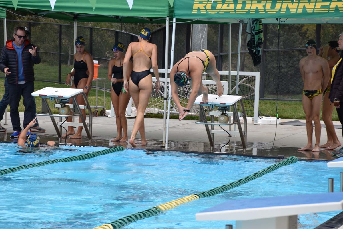 People enjoying the swim meet