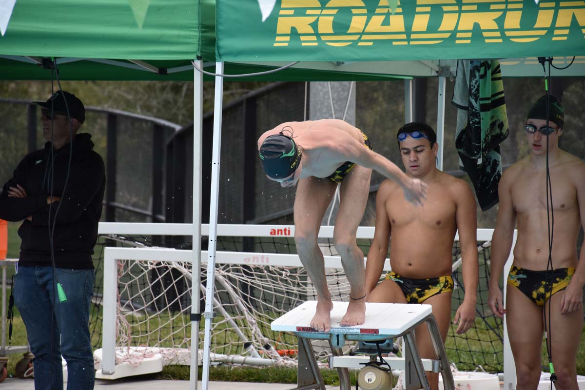 People enjoying the swim meet